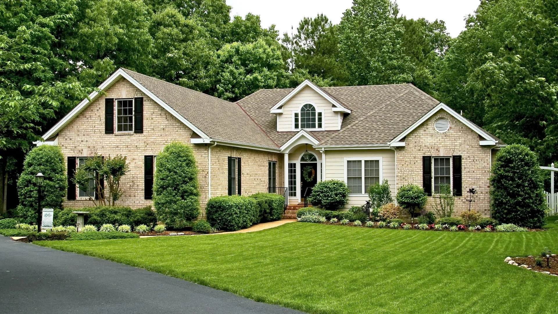 Healthy green lawn at large home in Huntersville, NC.