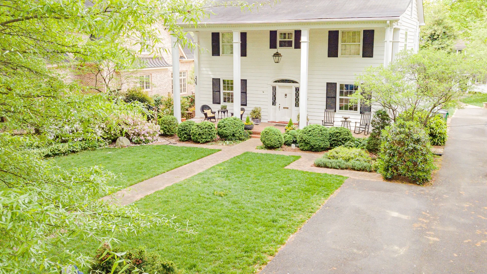 Several trees and shrubs at a Huntersville, NC property.